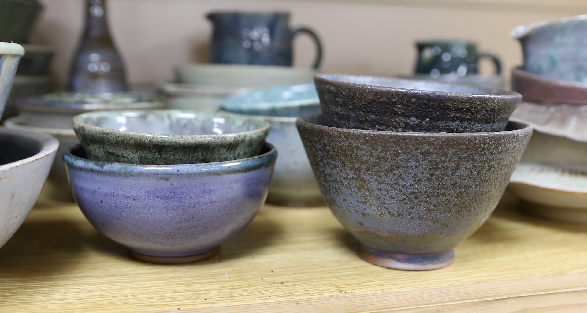 A collection of studio pottery bowls jugs and dishes